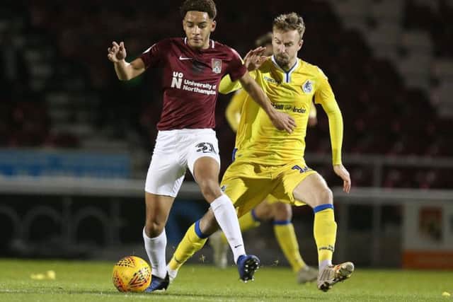 Chris Lines battles with Jay Williams during Bristol Rovers' 2-1 Checkatrade Trophy win over the Cobblers in January (Picture: Pete Norton)