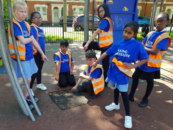 Young ambassadors from St James Primary School with the tarmac square.
