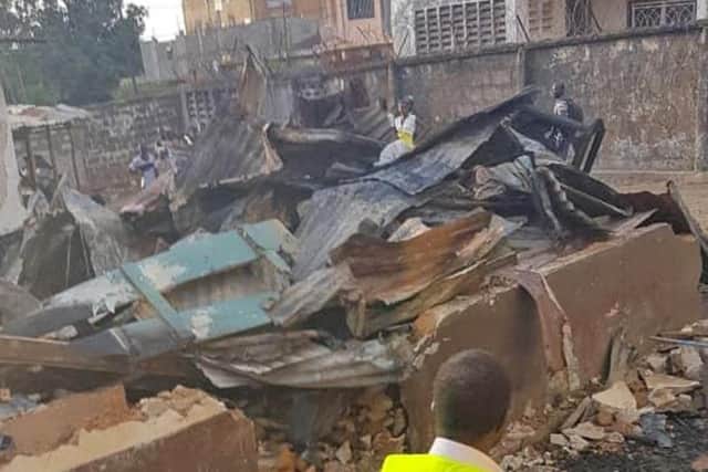 An electrical pole destroyed Robert Johnson's family home in Africa, leaving 15 people homeless.