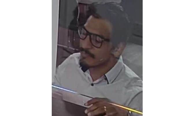 The face of a man police would like to speak to in connection with the theft of two cash cards. NNL-190523-133634005
