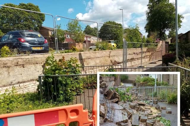 There has been no repair work to secure the wall in Wade Meadow Court since it fell down in July last year.