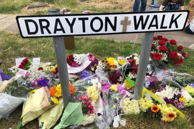 Fresh flowers were laid at the entrance to Drayton Walk.