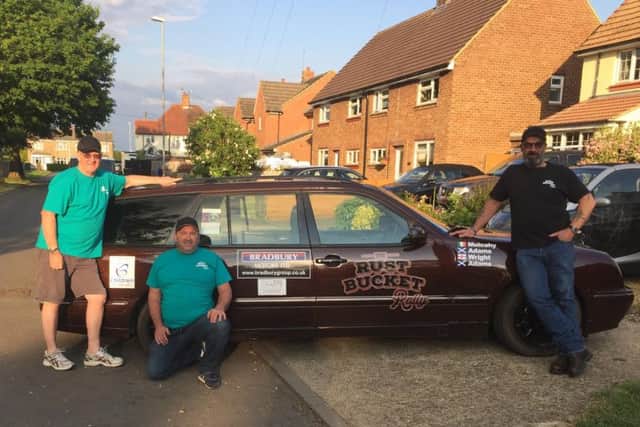 Dave Adams, Bruce Wright and Chris Mulcahy along with their very own rust bucket, Big Bertha.