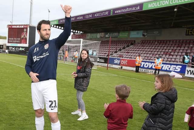 John-Joe O'Toole says goodbye to the Cobblers fans following the final home game of the season