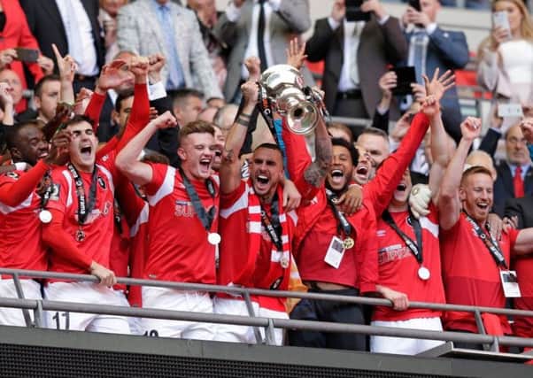 Salford City celebrate their National League play-off final win at Wembley