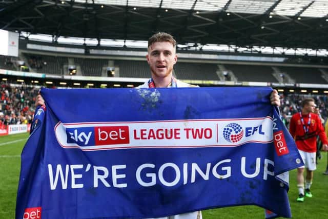 Ryan Watson helped Milton Keynes to promotion from Sky Bet League Two