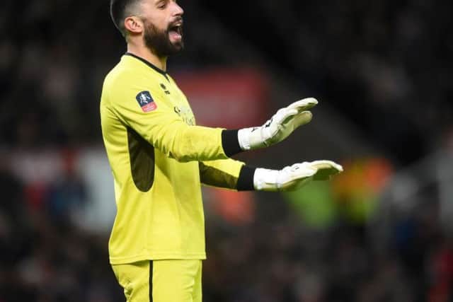 Goalkeeper Steve Arnold has signed for the Cobblers