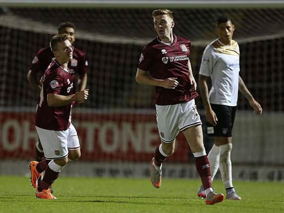 Ryan Watson celebrates scoring for the Cobblers against Colchester United in 2015
