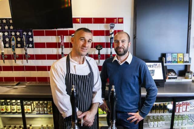 Chef Admir Tagani and manager of the Kingsthorpe Buddies USe Will Thomas stand in the newly refurbished bar area.