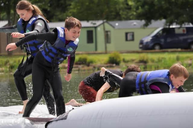 Flip Out Aqua Park, which floats on Billing Aquadrome's Willow Lake, is billed as an adrenaline-filled family adventure. The aqua park is open to the general public as well as holiday makers.