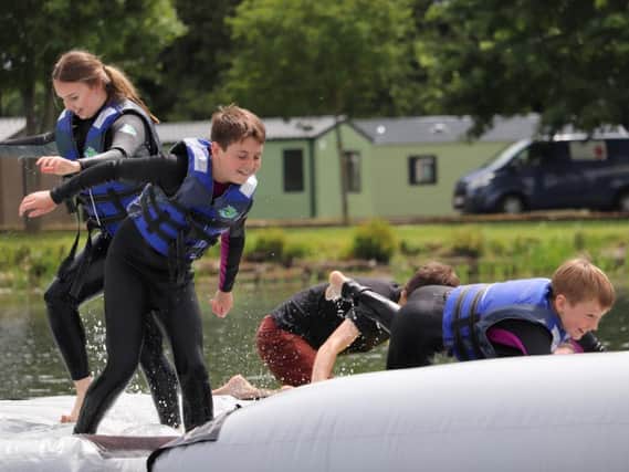 Flip Out Aqua Park, which floats on Billing Aquadrome's Willow Lake, is billed as an adrenaline-filled family adventure. The aqua park is open to the general public as well as holiday makers.