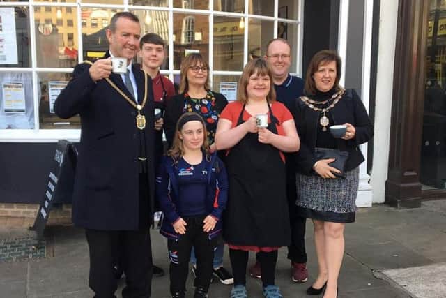 Cafe Track staff with paralympic gold medallist Ellie" Robinson MBE and the former Mayor and Mayoress of Northampton.