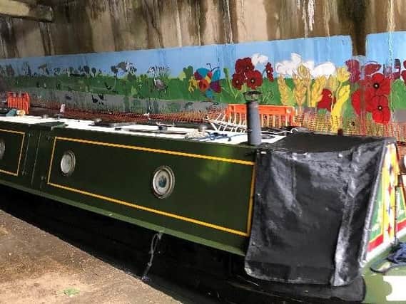 Rothersthorpe Primary School's mural in the canal tunnel. Photo: Nicola Fountain