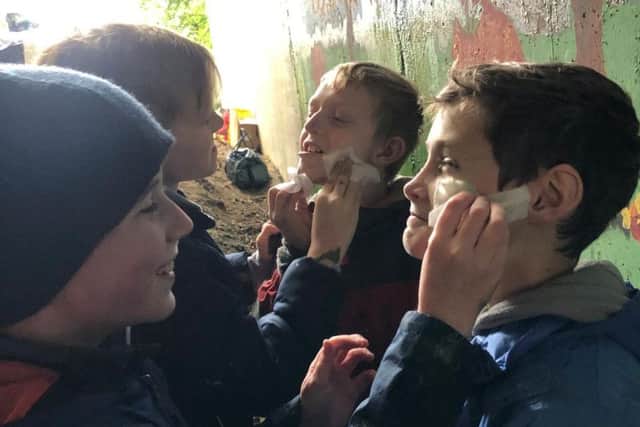 The pupils had lots of fun painting the mural, and each other! Photo: Nicola Fountain