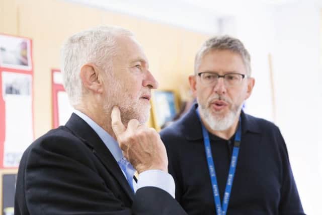 Robin Burgess, chief executive of Northampton Hope Centre, with Labour Party leader Jeremy Corbyn during a recent visit