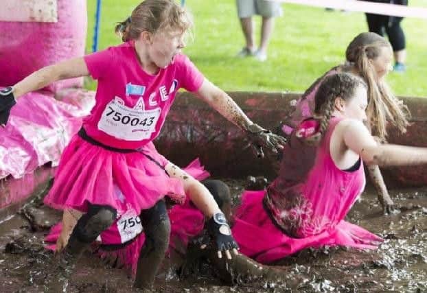 Competitors will make their way through a Pretty Muddy 5k course around the park