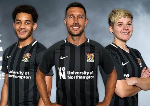 The new Cobblers away kit is modelled by Cobblers defenders Jay Williams and Joe Martin, and Alex Bartlett from Northampton Town Ladies