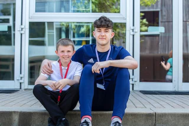 Nathaniel Clark from Northampton Academy pictured with Charlie Johnson.