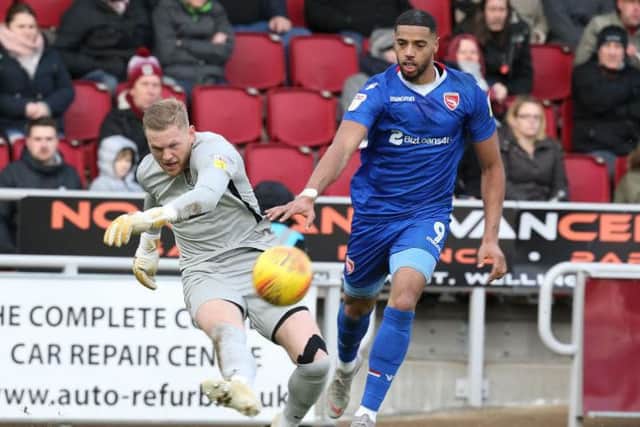 Vadaine Oliver in action for Morecambe against the Cobblers last season