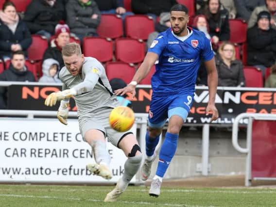 Vadaine Oliver in action for Morecambe against the Cobblers last season
