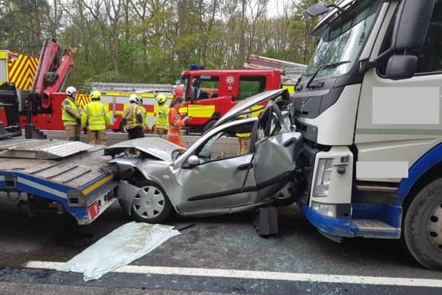 The car was crushed between two lorries on the M1 near Northampton. Photo: Northamptonshire Police