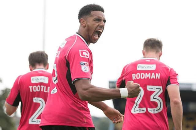 Vadaine Oliver celebrates scoring a goal for Notts County