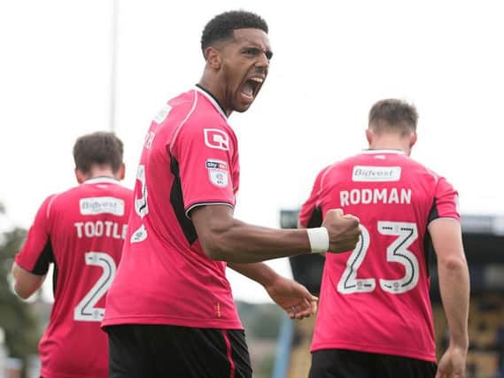 Vadaine Oliver celebrates scoring a goal for Notts County