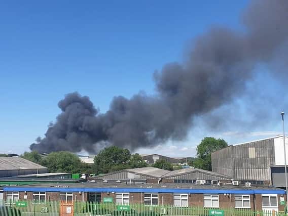 The smoke caused by the fire at the Wellingborough recycling centre. Photo: Tom Whitney/Twitter