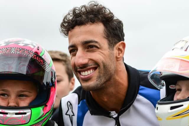 Formula 1 driver Daniel Ricciardo with two young racers at Whilton Mill karting track near Daventry. Photo: James Fitchew Photography