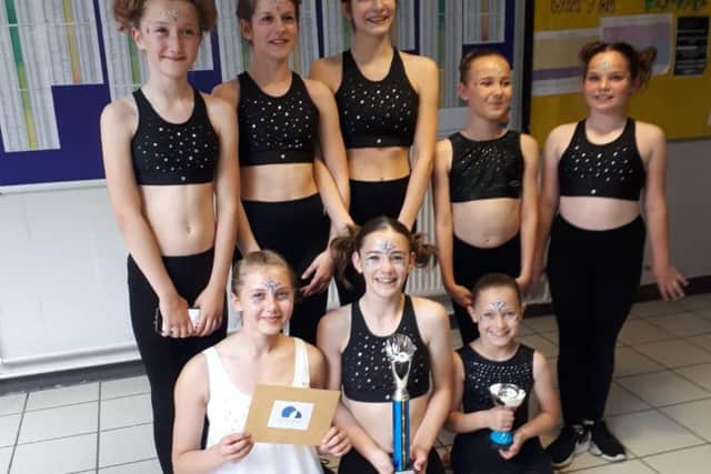 Team Acrocirque with their trophy. Photo: Zoiey Smale