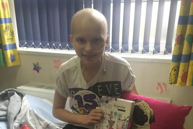 Ellie, pictured four years ago, has now been given the all clear and has selflessly appealed for more then 100 gifts to be given to the children's ward. Picture credit: Insight Magazine.