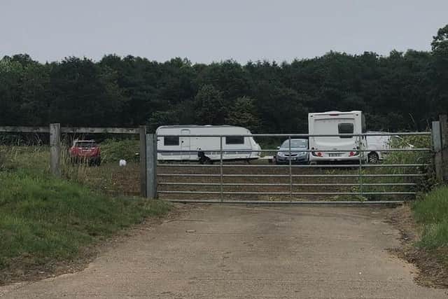 An encampment of travellers has arrived on a field in St Crispins.