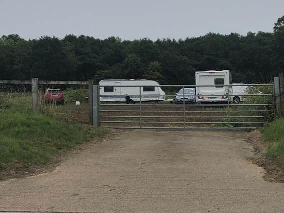 An encampment of travellers has arrived on a field in St Crispins.