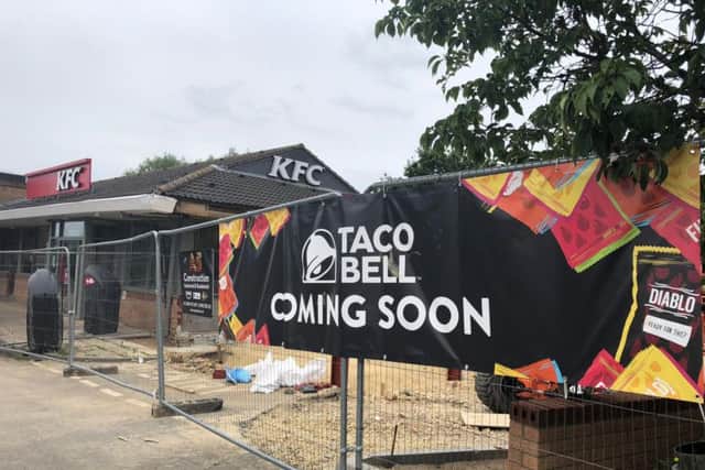 'Coming soon' signs have now gone up on the fencing surrounding the new Taco Bell.
