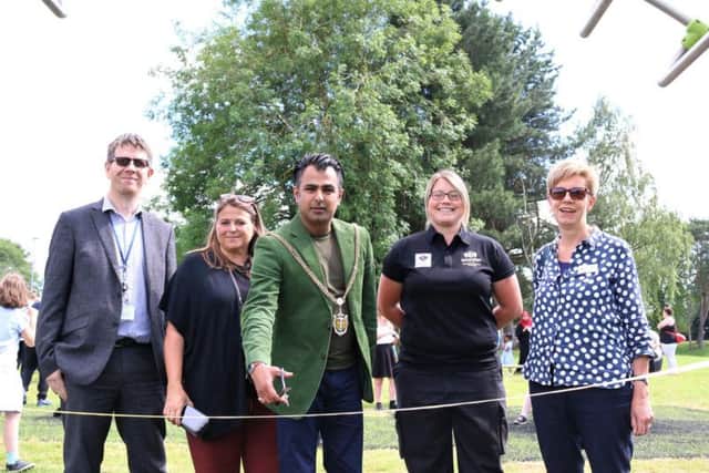 The mayor of Northampton Nazim Choudary pictured officially cutting the ribbon to unveil the new park.