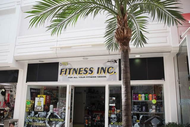 Fitness Inc health shop looking sunny under one of Market Walk's palm trees... c.2015.