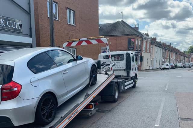 The car was loaded onto a trailer in The Mounts this morning.