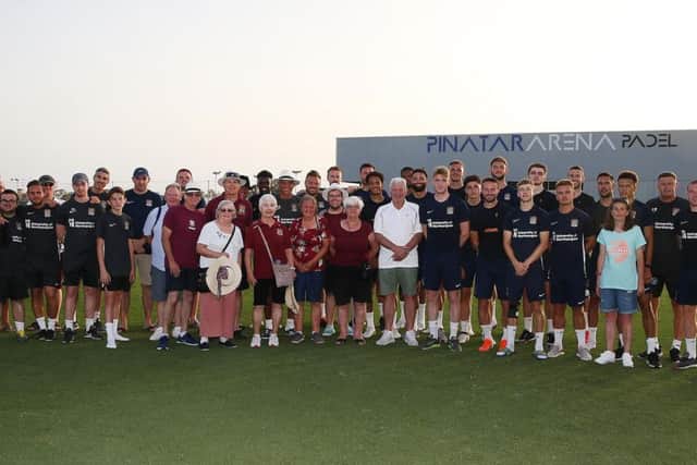 The Cobblers supporters and players get together for a team group