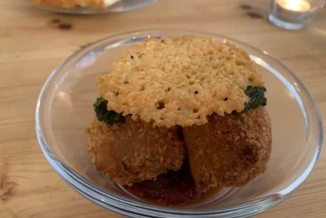 Roasted tomato arancini, parmesan crisp, confit tomato jam, pesto oil dressing
