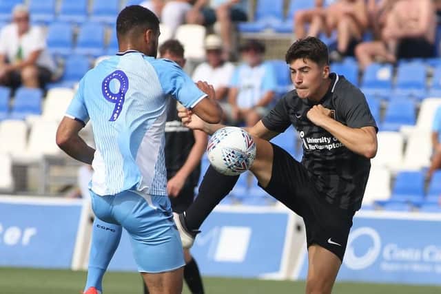 Scott Pollock battles for the ball in the 1-1 draw with Coventry