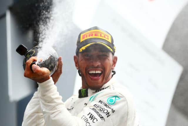 Lewis Hamilton celebrates his Silverstone victory