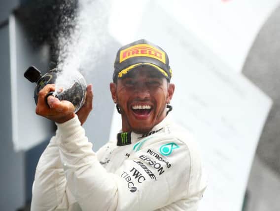 Lewis Hamilton celebrates his Silverstone victory