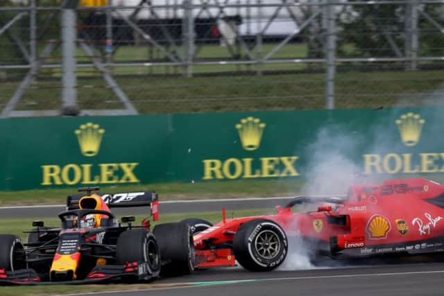 Max Verstappen and Sebastien Vettel get in a tangle