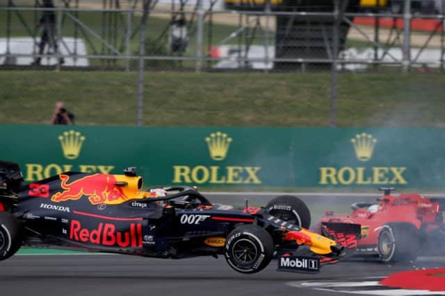 Max Verstappen takes off after his clash with Sebastien Vettel's Ferrari
