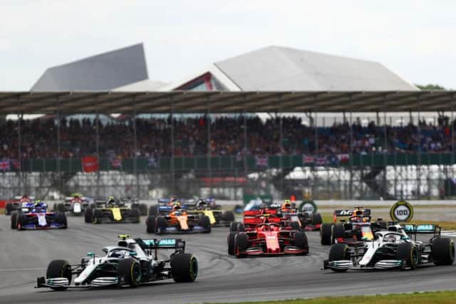 The Mercedes cars lead the way