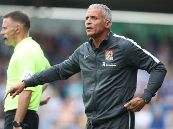 Keith Curle, minus his hat, watches on at the PTS. Picture: Pete Norton