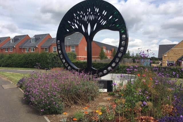 The flowers have all been planted by volunteers in the village.