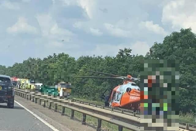MAGPAS air ambulance pictured yesterday at the scene of the crash.