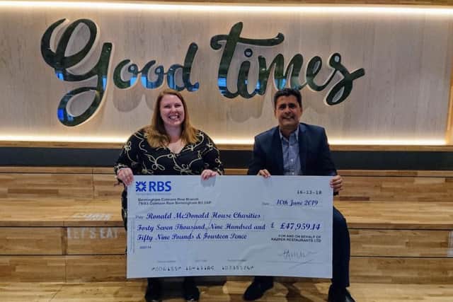 Northamptonshire McDonald's franchisee Perry Akhtar presents a cheque to Ronald McDonald House Charities. Photo: McDonald's