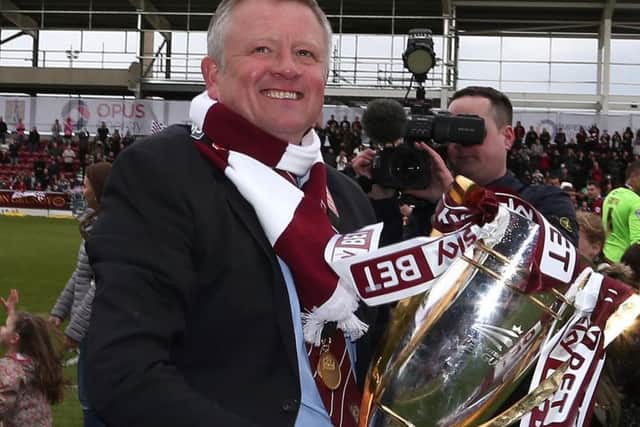 Chris Wilder enjoys the Cobblers' title win in 2016